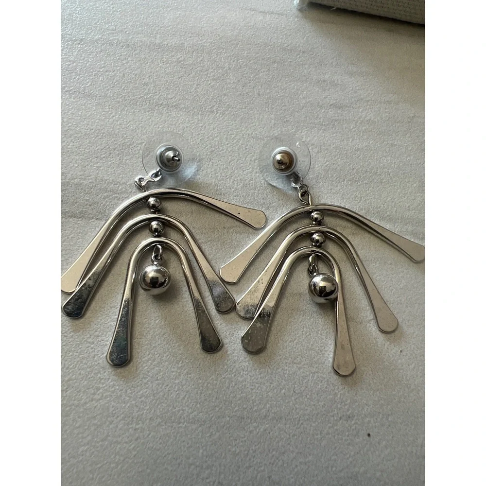 Silver Tone Articulating Paddle Earrings - Picture 3 of 3